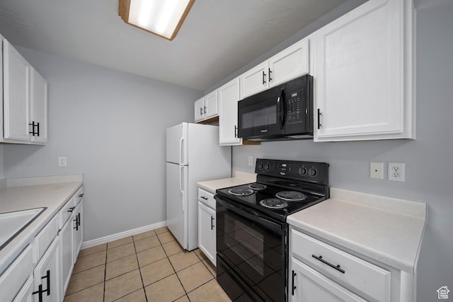 1957 N 2225 W, Clinton, UT 84015 - kitchen with black appliances, white cabinets, light countertops, and baseboards