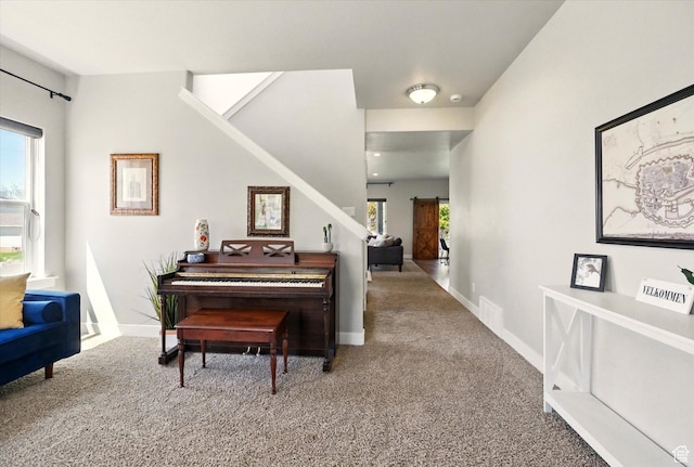living area with carpet floors and baseboards