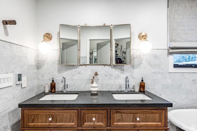 4279 S Lares Cir, Salt Lake City, UT 84124 - full bath featuring double vanity, a freestanding bath, and tile walls