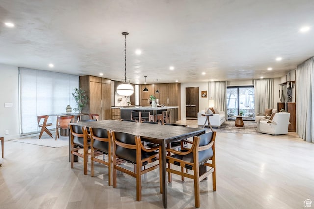 4279 S Lares Cir, Salt Lake City, UT 84124 - dining space with recessed lighting and light wood-style floors