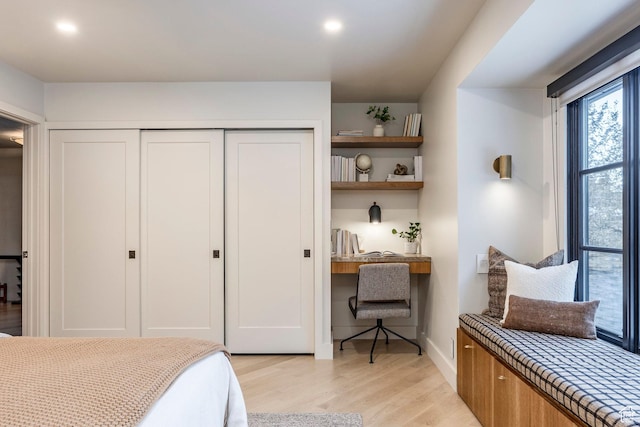 4279 S Lares Cir, Salt Lake City, UT 84124 - bedroom with light wood finished floors, a closet, baseboards, and recessed lighting