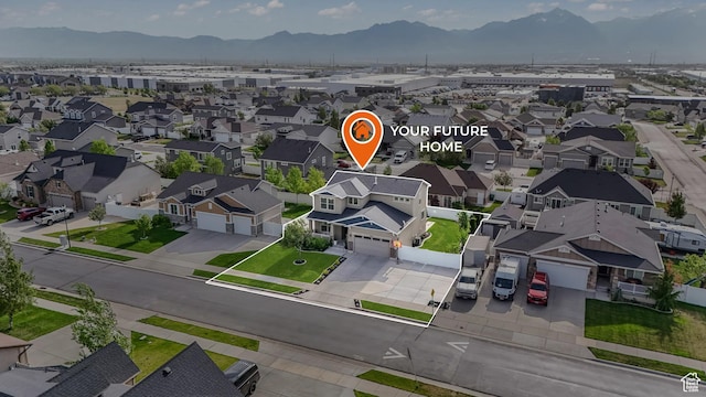 9559 S Lea Heather Way, West Jordan, UT 84081 - aerial view of residential area featuring a mountain backdrop