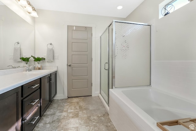 9559 S Lea Heather Way, West Jordan, UT 84081 - full bath with vanity, a garden tub, a stall shower, and baseboards