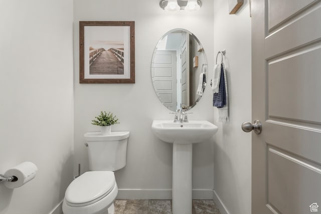9559 S Lea Heather Way, West Jordan, UT 84081 - bathroom featuring baseboards and toilet