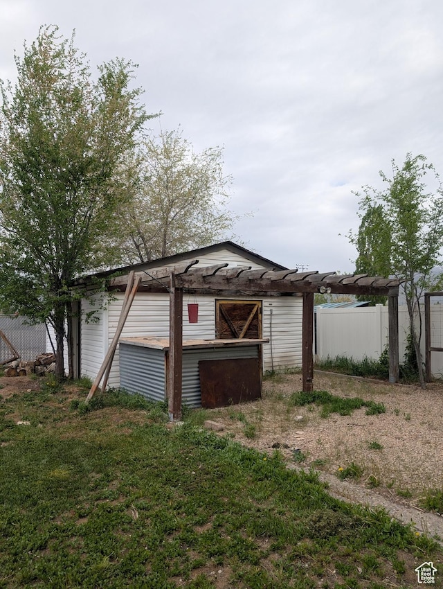 garage featuring fence