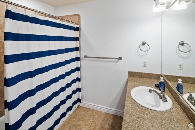 2706 W Falcon Ridge Way, Lehi, UT 84043 - bathroom with vanity, tile patterned flooring, a shower with curtain, and baseboards