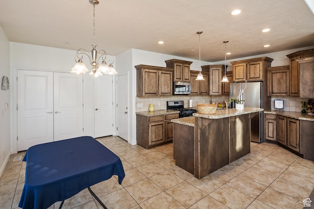 2706 W Falcon Ridge Way, Lehi, UT 84043 - kitchen featuring appliances with stainless steel finishes, tasteful backsplash, light stone countertops, recessed lighting, and an island with sink