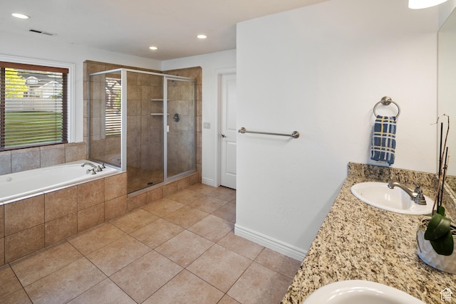 2706 W Falcon Ridge Way, Lehi, UT 84043 - bathroom featuring tile patterned flooring, a shower stall, vanity, a garden tub, and recessed lighting