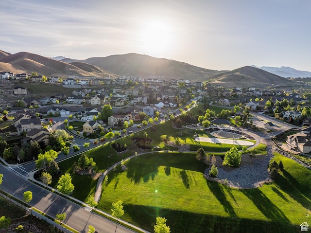 2706 W Falcon Ridge Way, Lehi, UT 84043 - aerial overview of property's location featuring nearby suburban area and a mountainous background