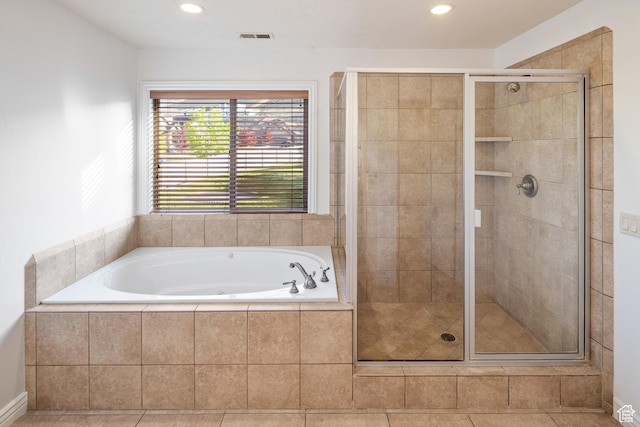 2706 W Falcon Ridge Way, Lehi, UT 84043 - full bathroom featuring a garden tub, a shower stall, and recessed lighting