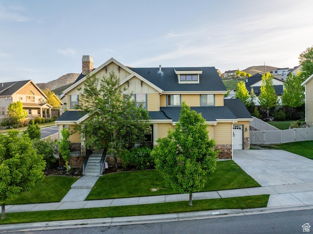 2706 W Falcon Ridge Way, Lehi, UT 84043 - craftsman house with a gate, driveway, a residential view, and stone siding