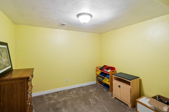 2706 W Falcon Ridge Way, Lehi, UT 84043 - game room with dark colored carpet, a textured ceiling, and baseboards
