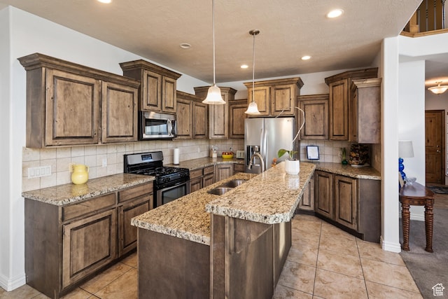 2706 W Falcon Ridge Way, Lehi, UT 84043 - kitchen featuring stainless steel appliances, an island with sink, a sink, recessed lighting, and backsplash