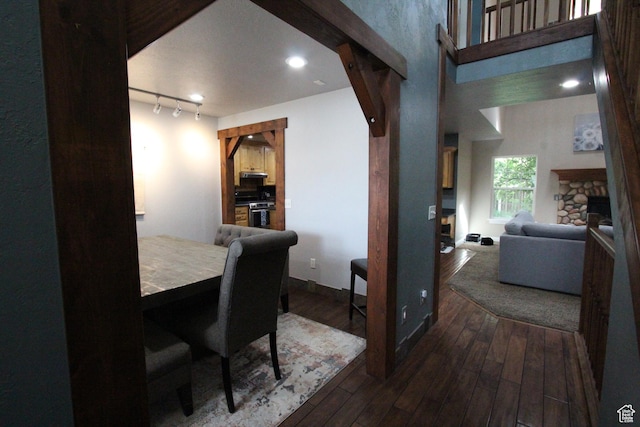 463 E 200 N, Mapleton, UT 84664 - dining room featuring hardwood / wood-style flooring, a stone fireplace, and rail lighting