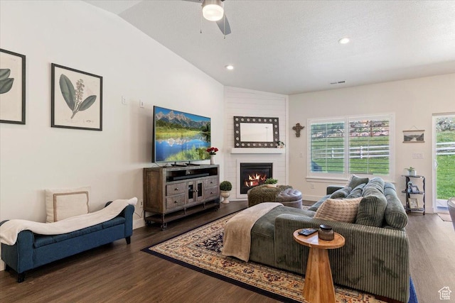 1008 N Vista Loop, Morgan, UT 84050 - living room with lofted ceiling, wood finished floors, ceiling fan, a fireplace, and recessed lighting