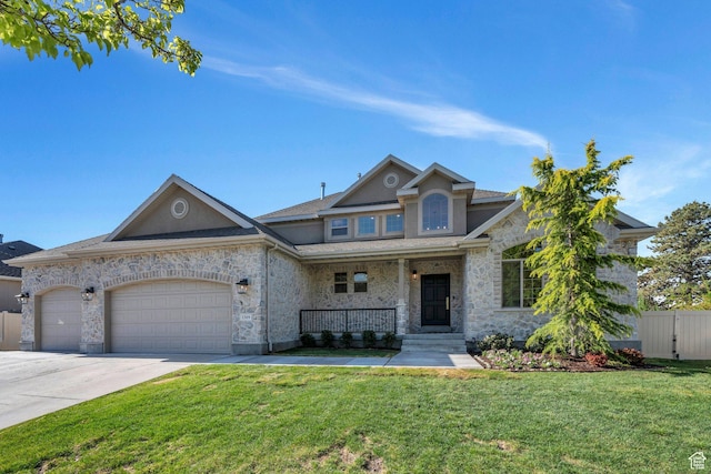 1309 W 1870 N, Provo, UT 84604 - view of front facade with a porch, stone siding, a garage, concrete driveway, and stucco siding