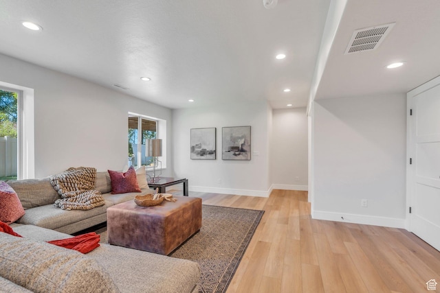 1309 W 1870 N, Provo, UT 84604 - living room with healthy amount of natural light, baseboards, light wood-style floors, and recessed lighting