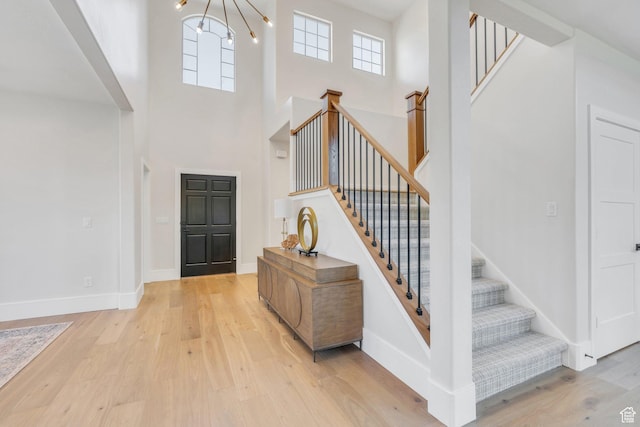 1309 W 1870 N, Provo, UT 84604 - foyer with wood finished floors, a high ceiling, stairway, baseboards, and a chandelier