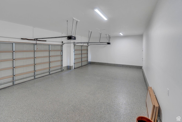1309 W 1870 N, Provo, UT 84604 - garage with a garage door opener, baseboards, and a baseboard radiator