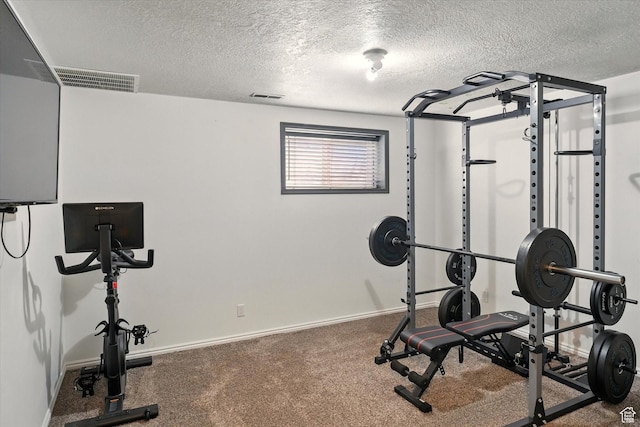 621 N 300 E, Brigham City, UT 84302 - workout area with a textured ceiling, baseboards, and carpet