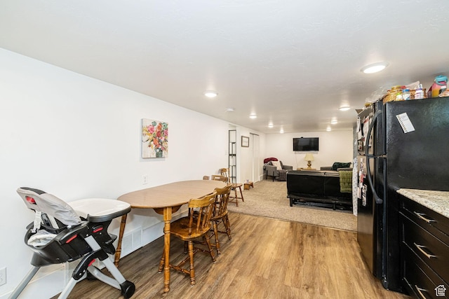 141 W 400 N, Logan, UT 84321 - dining room featuring light wood finished floors, baseboards, and recessed lighting
