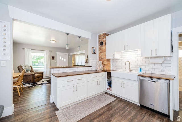 141 W 400 N, Logan, UT 84321 - kitchen featuring stainless steel dishwasher, a sink, butcher block countertops, and dark wood-type flooring