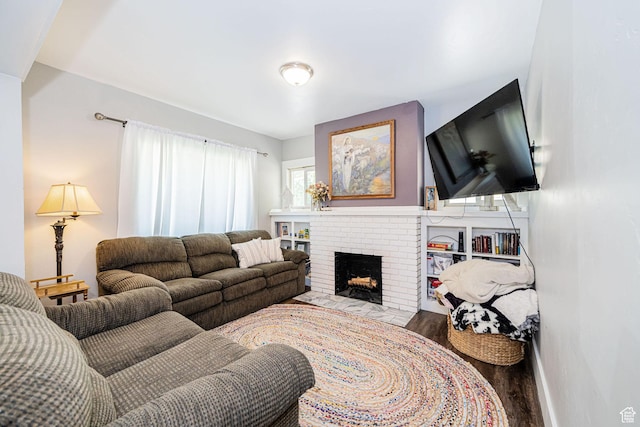141 W 400 N, Logan, UT 84321 - living room featuring wood finished floors and a fireplace