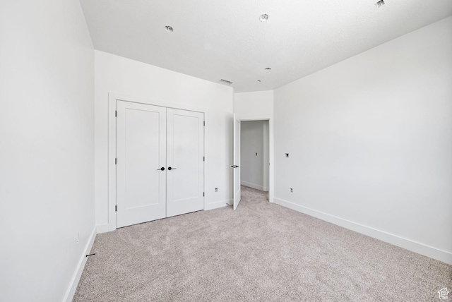 295 N 1580 W Unit 101, Pleasant Grove, UT 84062 - unfurnished bedroom with light colored carpet and a closet
