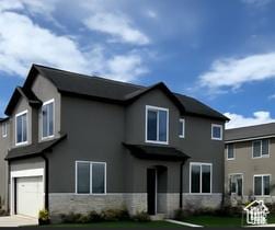295 N 1580 W Unit 101, Pleasant Grove, UT 84062 - view of front facade featuring a garage, stone siding, a front lawn, and stucco siding