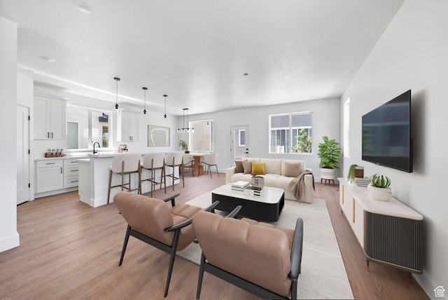 295 N 1580 W Unit 101, Pleasant Grove, UT 84062 - living area with light wood-style floors