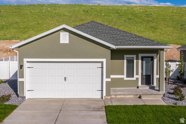 7308 Bald Eagle Way N, Eagle Mountain, UT 84005 - single story home with a garage, driveway, and stucco siding