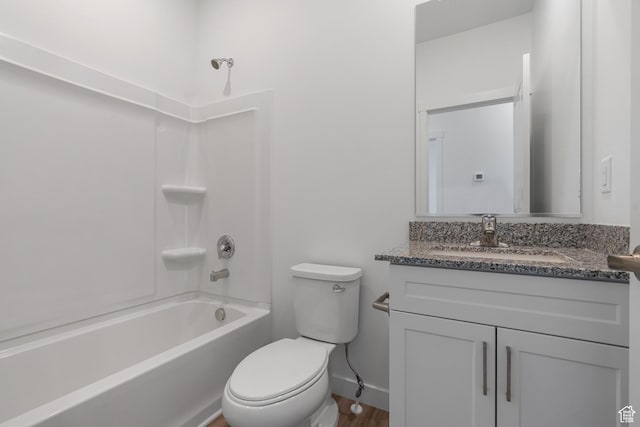 7308 Bald Eagle Way N, Eagle Mountain, UT 84005 - full bath featuring toilet, vanity, baseboards, bathing tub / shower combination, and wood finished floors