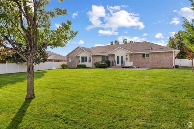 10539 S Haven View Ct W, South Jordan, UT 84095 - view of front of property with french doors, brick siding, and a patio area