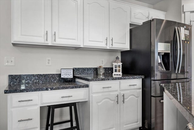 10539 S Haven View Ct W, South Jordan, UT 84095 - kitchen with stainless steel refrigerator with ice dispenser, white cabinets, and dark stone countertops