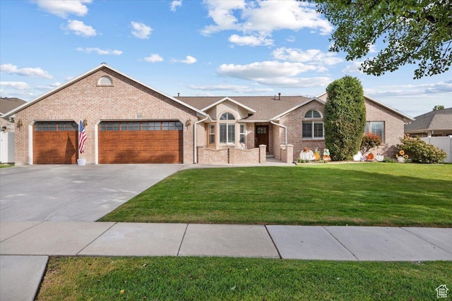10539 S Haven View Ct W, South Jordan, UT 84095 - single story home with an attached garage, brick siding, driveway, and a front lawn