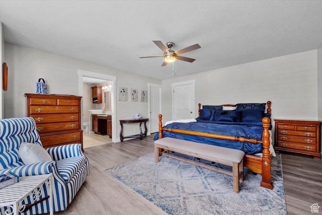 10539 S Haven View Ct W, South Jordan, UT 84095 - bedroom with wood finished floors, ceiling fan, and ensuite bath
