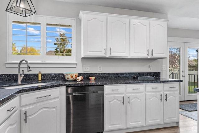 10539 S Haven View Ct W, South Jordan, UT 84095 - kitchen featuring stainless steel dishwasher, a sink, white cabinets, dark stone countertops, and hanging light fixtures