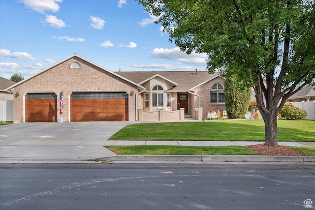 10539 S Haven View Ct W, South Jordan, UT 84095 - ranch-style home with an attached garage, brick siding, and driveway