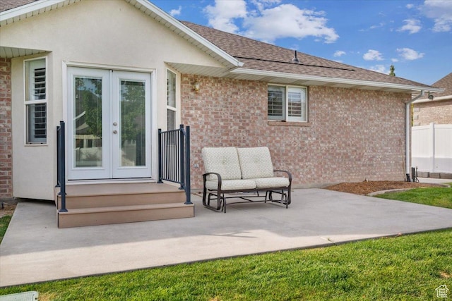 10539 S Haven View Ct W, South Jordan, UT 84095 - back of property featuring french doors, a patio, brick siding, and a shingled roof