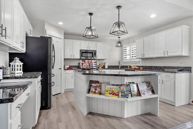 10539 S Haven View Ct W, South Jordan, UT 84095 - kitchen featuring appliances with stainless steel finishes, open shelves, white cabinets, light wood finished floors, and recessed lighting