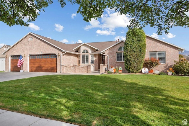 10539 S Haven View Ct W, South Jordan, UT 84095 - ranch-style home featuring an attached garage, brick siding, driveway, and a front yard