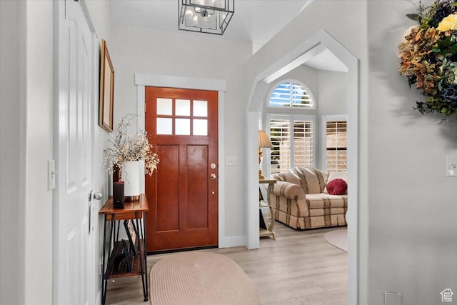 10539 S Haven View Ct W, South Jordan, UT 84095 - entryway featuring light wood-style flooring, baseboards, and a chandelier