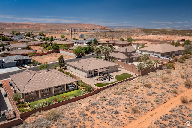aerial perspective of suburban area with mountains