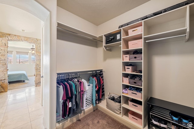 spacious closet with tile patterned flooring
