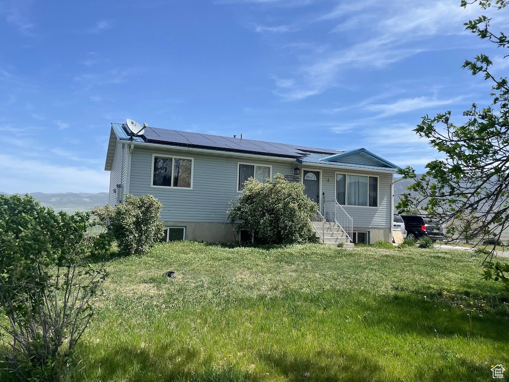 8890 W 26000 N, Portage, UT 84331 - view of front of property featuring roof mounted solar panels