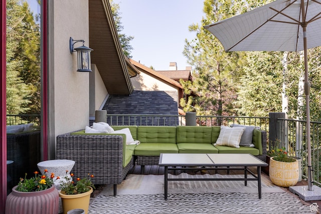 view of patio with an outdoor hangout area and a balcony