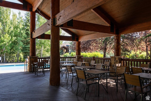 deck with outdoor dining area