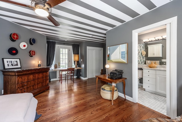 1677 E Yalecrest Ave, Salt Lake City, UT 84105 - bedroom featuring wood finished floors, baseboards, and ensuite bath