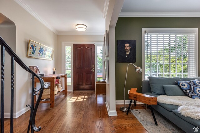 1677 E Yalecrest Ave, Salt Lake City, UT 84105 - entrance foyer featuring ornamental molding, baseboards, wood finished floors, and stairs