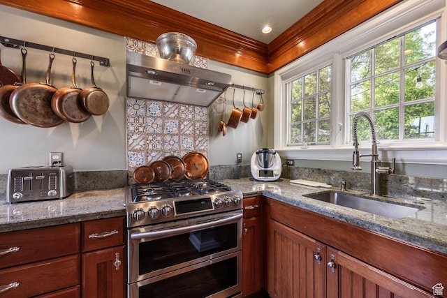 1677 E Yalecrest Ave, Salt Lake City, UT 84105 - kitchen with range with two ovens, a sink, range hood, and stone countertops